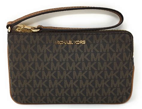 michael kors jet set travel large logo wristlet|Michael Kors wallet.